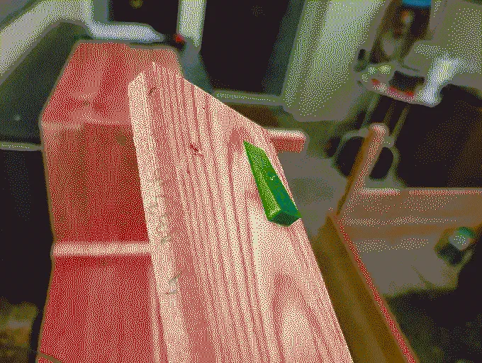 
              The 3D printed spacer placed on a wood plank to ensure the angle is correct
            
